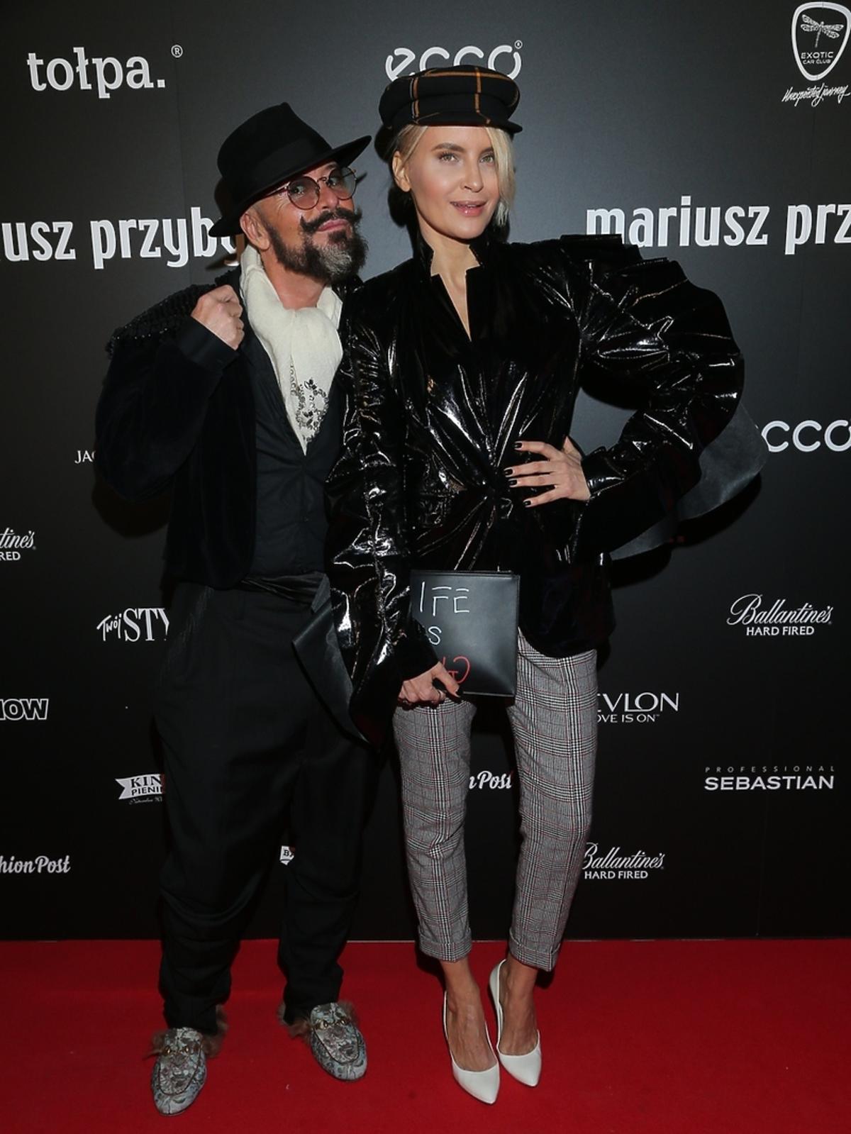 Tomasz Jacyków i Joanna Horodyńska na pokazie mody Mariusza Przybylskiego