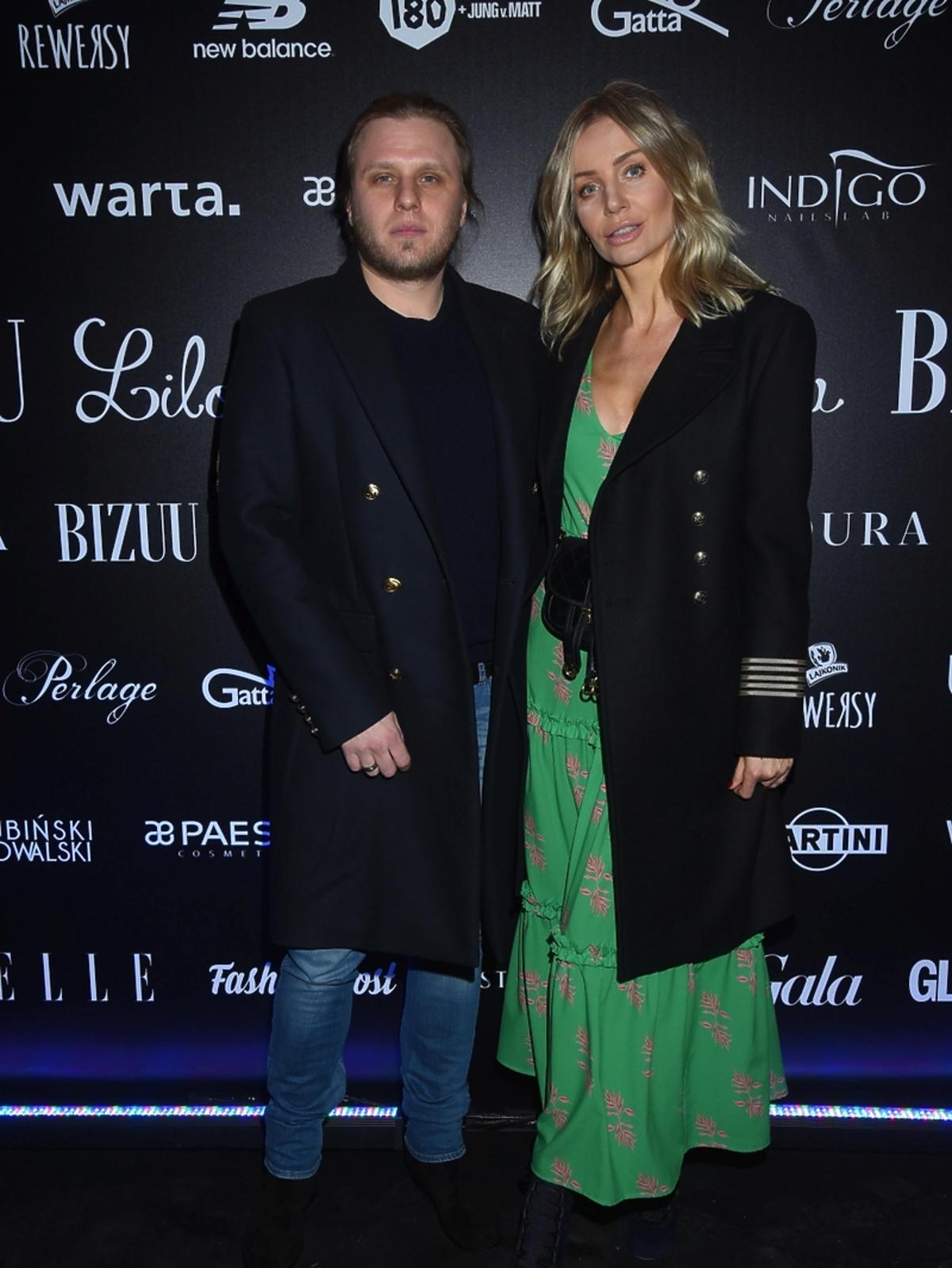 Agnieszka Woźniak Starak z mężem, Piotrem na pokazie bizuu