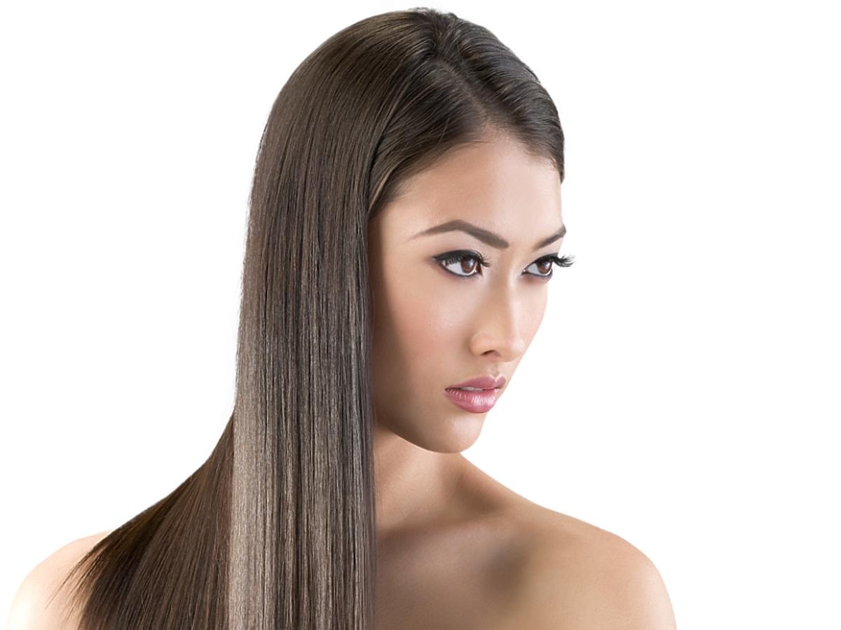 azjatycka kobieta ze zdrowymi, lśniącymi włosami