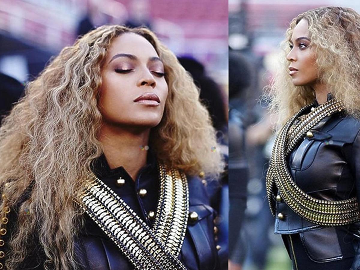 Beyonce w czarny skórzanym żakiecie i pofalowanych włosach z metalicznym makijażem