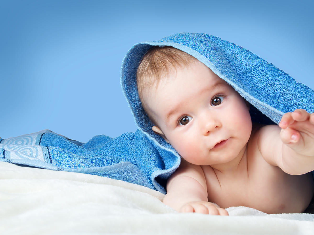 Dziecko pod ręcznikiem