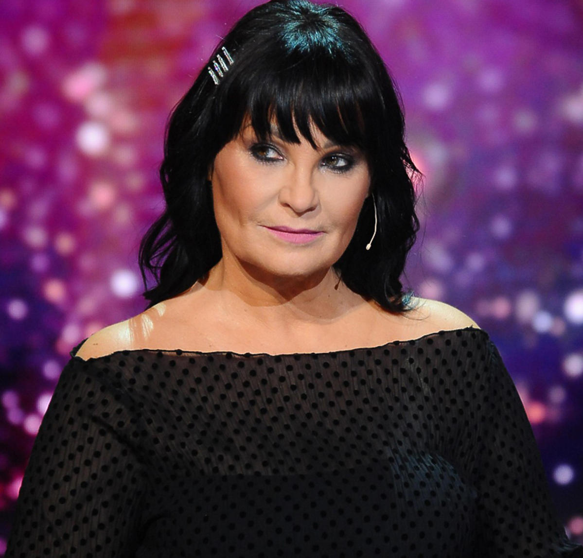 Iwona Pavlović w czarnej sukience