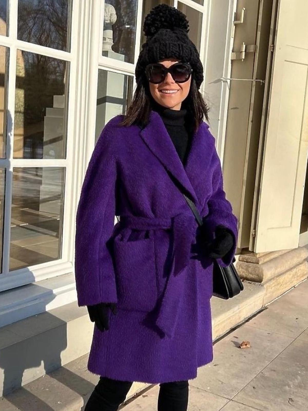 Katarzyna Cichopek w fioletowym płaszczu