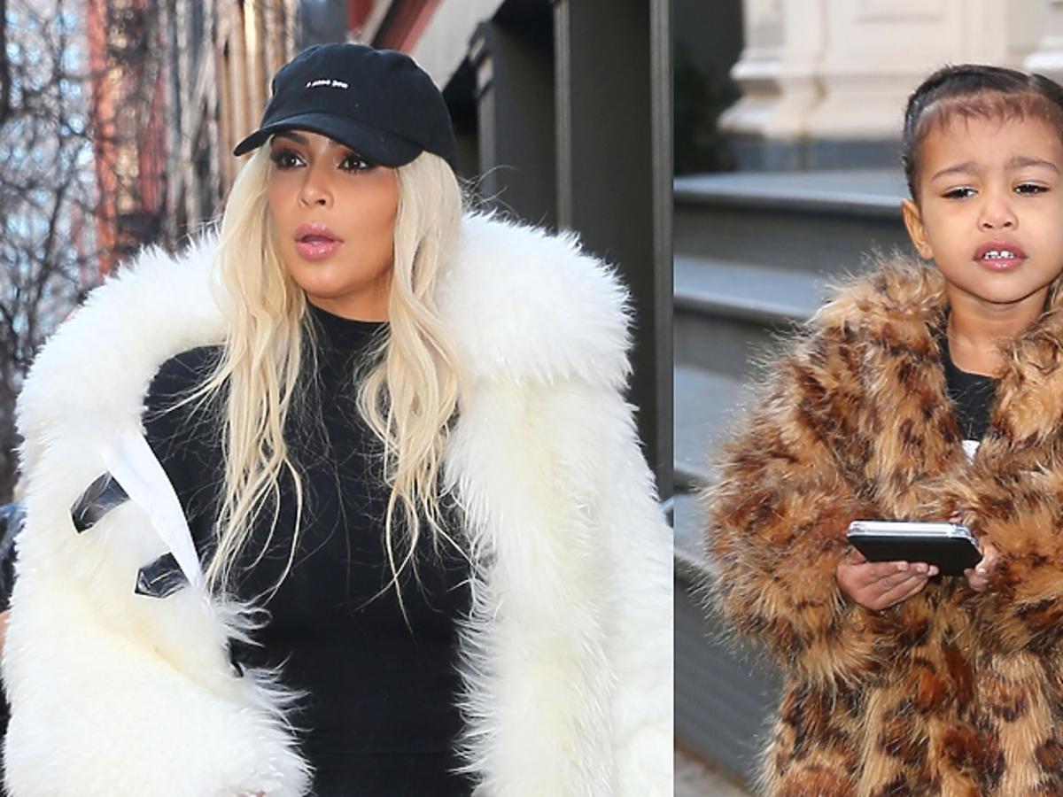Kim Kardashian w białym futrze i North West w brązowym futerku