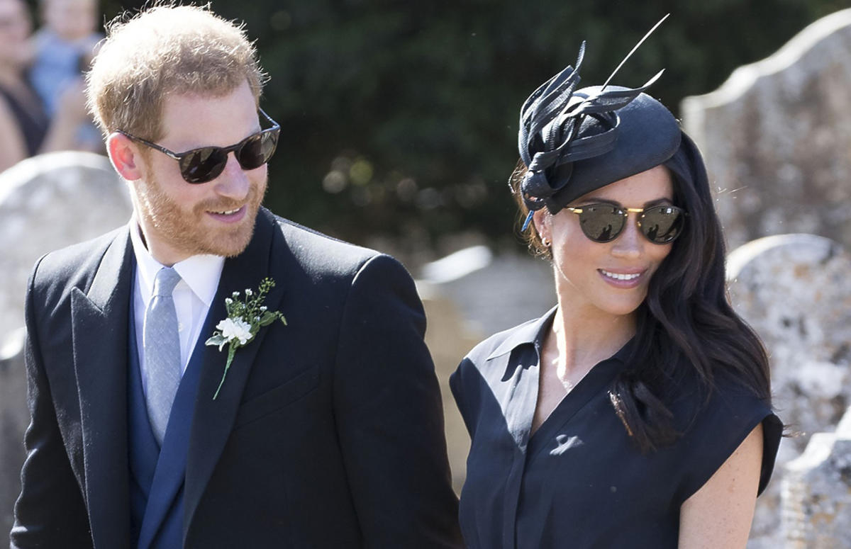 Książę Harry i Meghan Markle w okularach przeciwsłonecznych