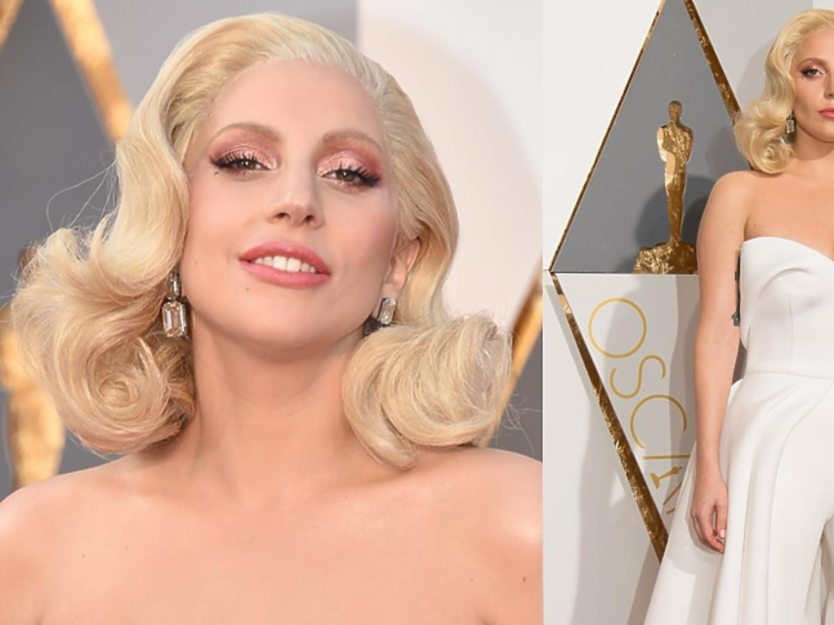 Lady Gaga w białym kombinezonie z trenem na czerwonym dywanie