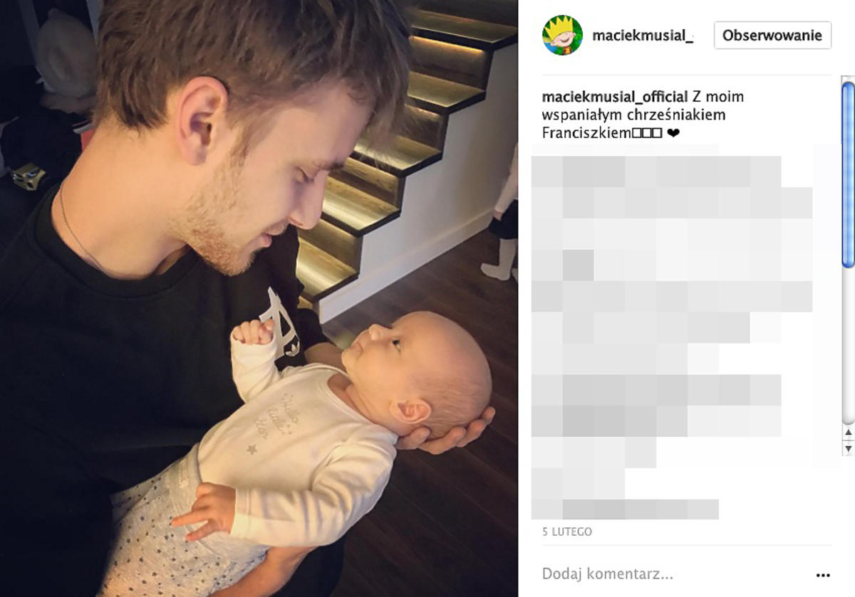 Maciej Musiał z dzieckiem
