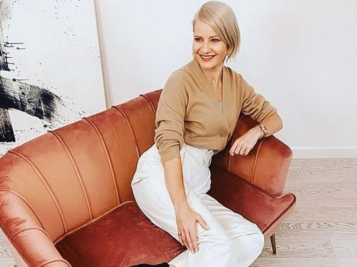 Małgorzata Kożuchowska w beżowym swetrze