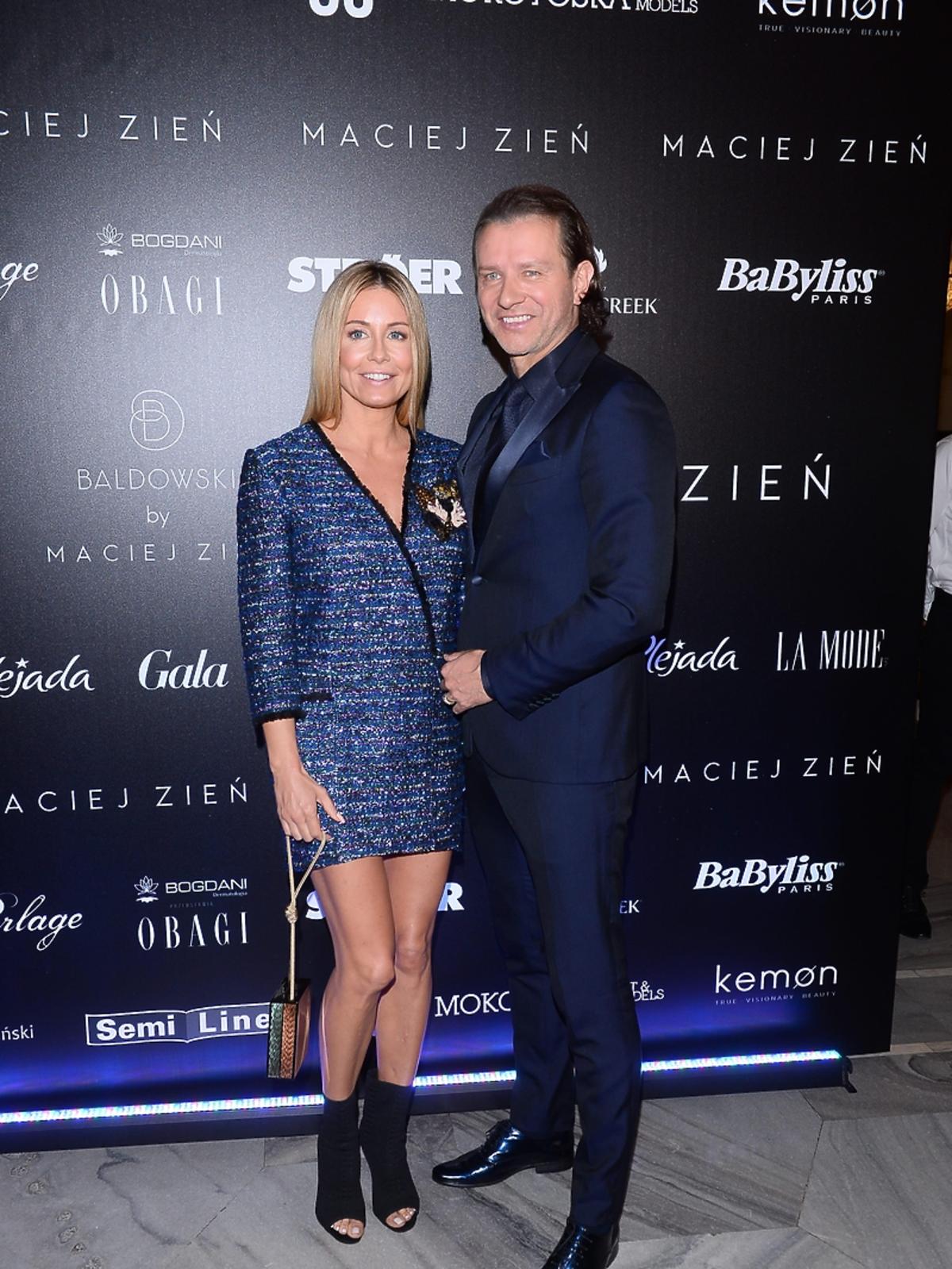 Małgorzata Rozenek i Radosław Majdan na pokazie Macieja Zienia