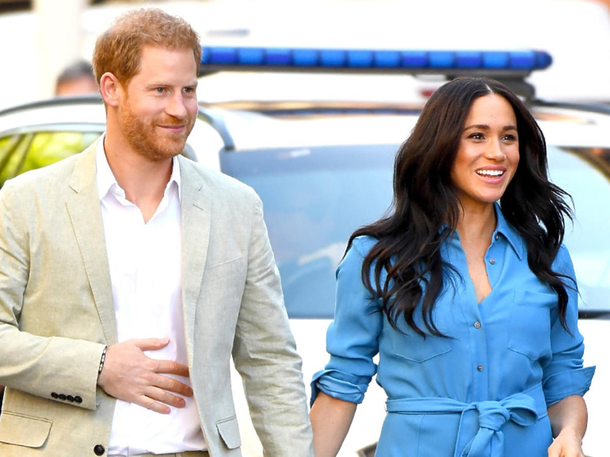 Meghan Markle, książę Harry trzymają się za ręce
