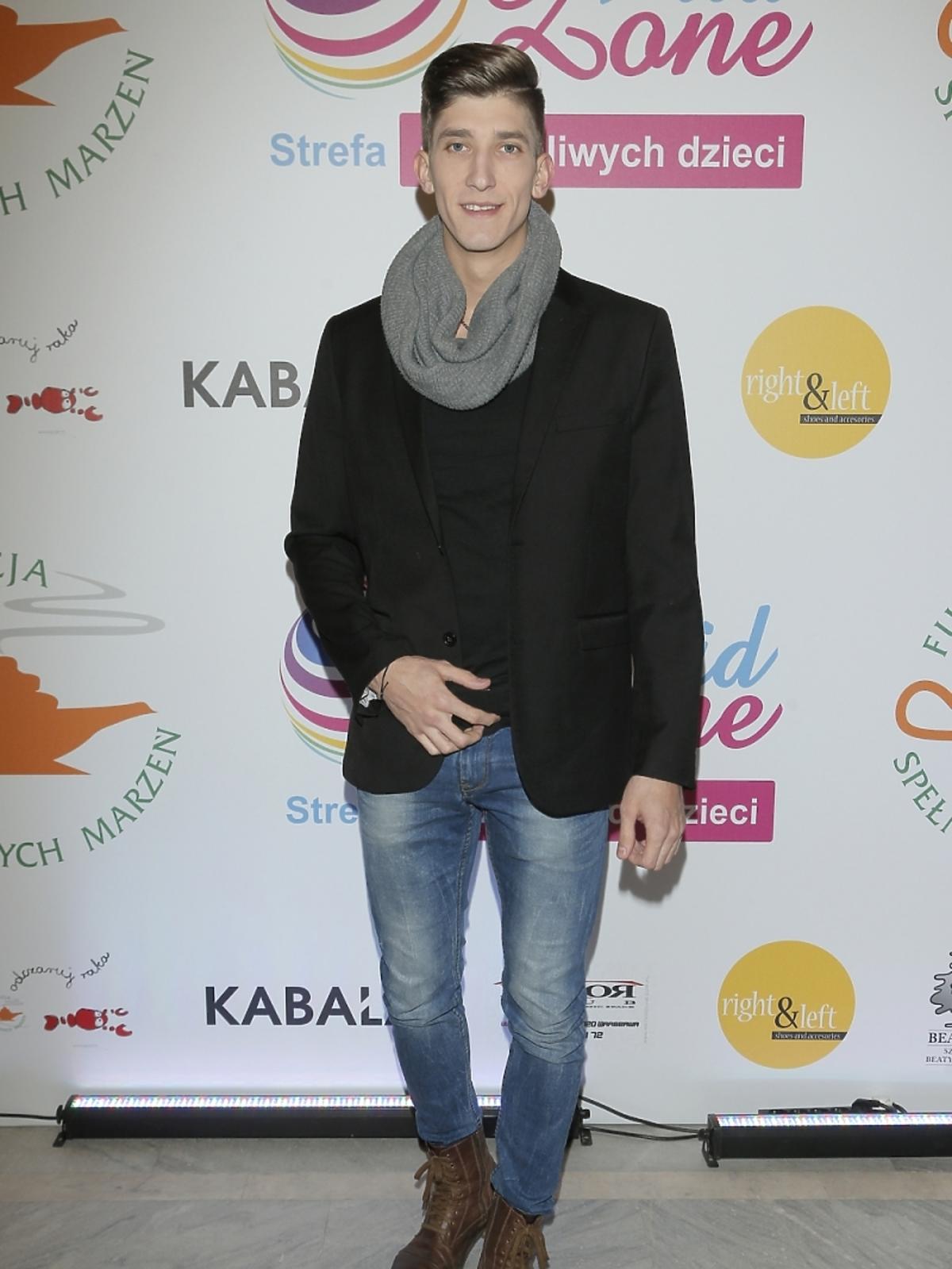 Michał Baryza na pokazie mody