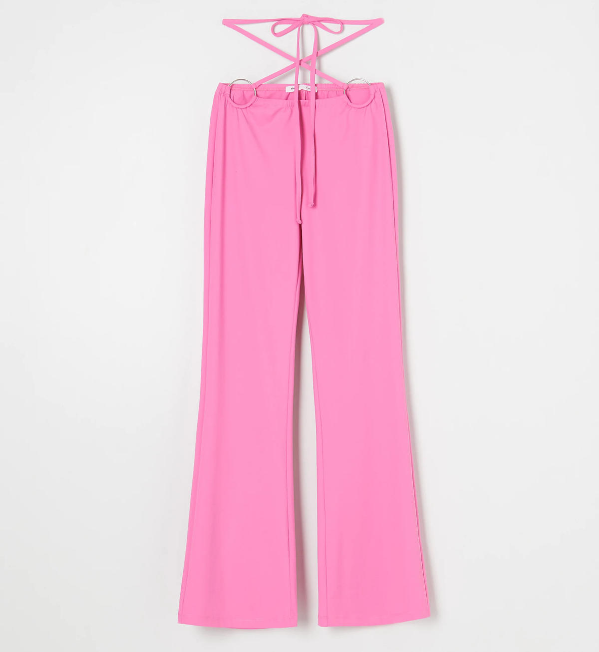 Różowe spodnie typu flare z Sinsay w stylu Klaudii Halejcio