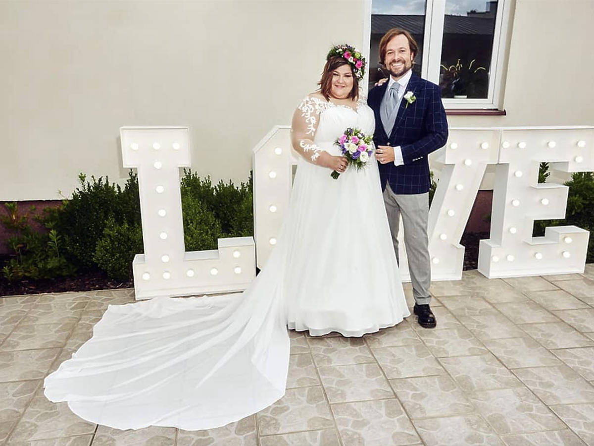 Ślub Dominiki Gwit, zdjęcie z mężem w sukni
