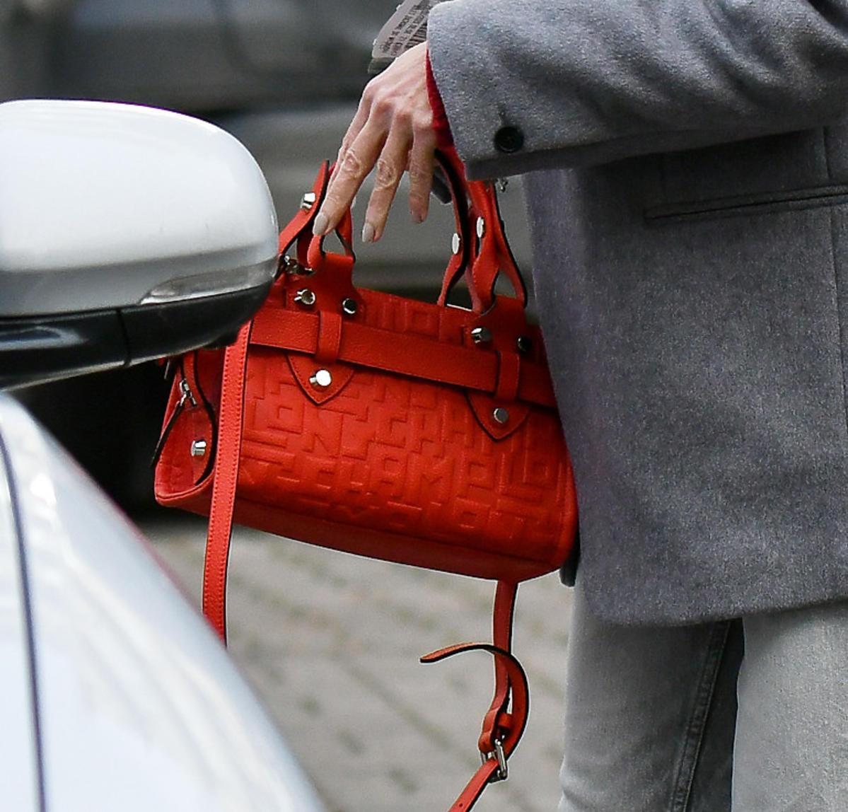 Małgorzata Kożuchowska z czerwoną torebką Longchamp